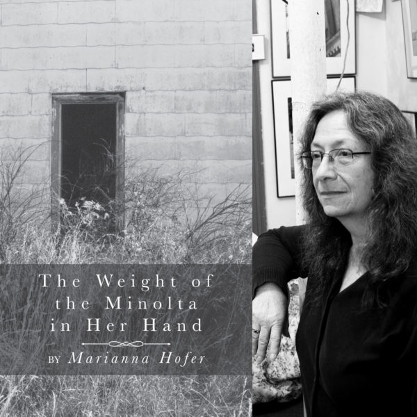 The Weight of the Minolta in Her Hand by Marianna Hofer
